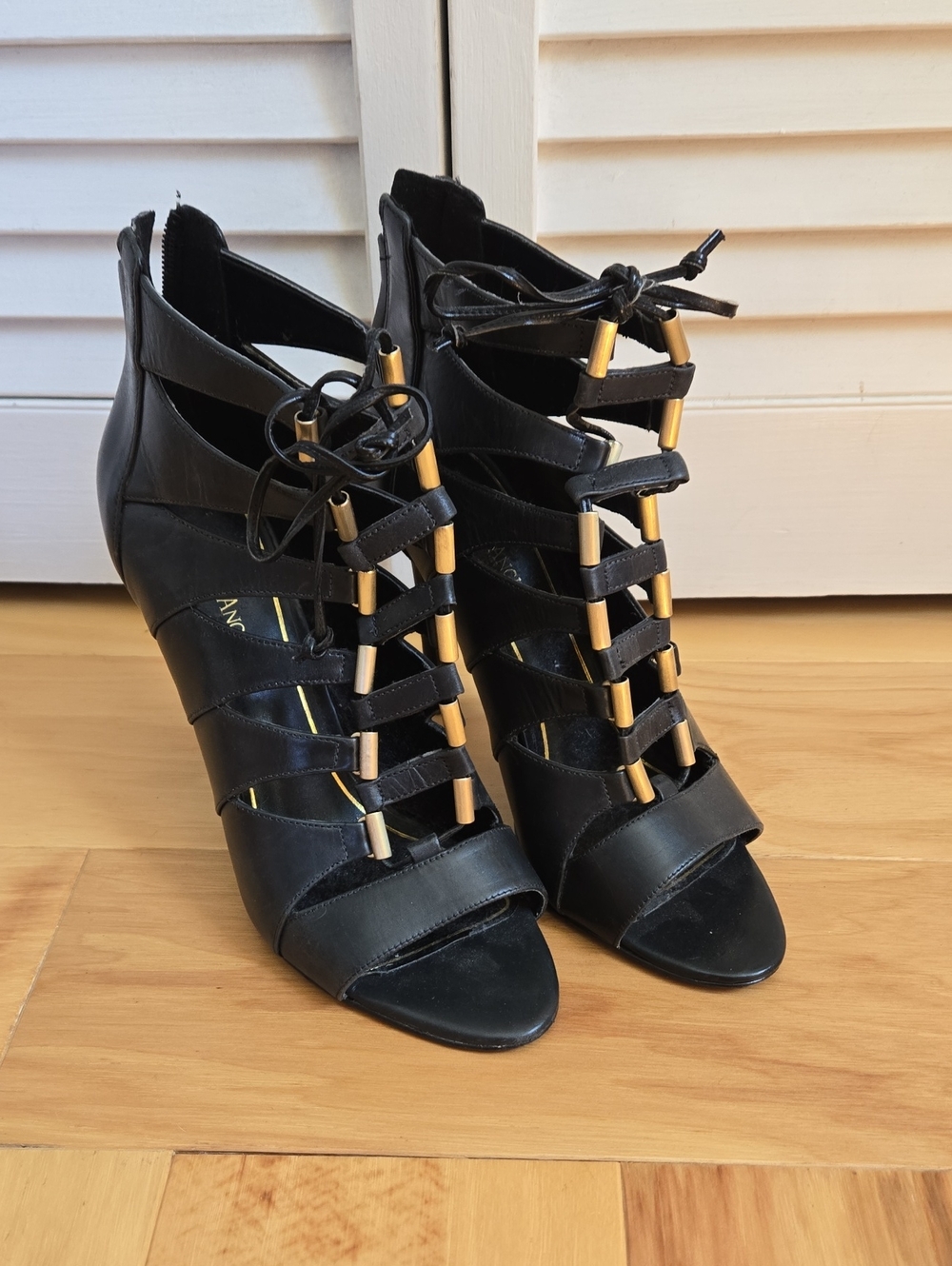 Enzo Angiolini Black Lace-Up Cage Heels with Gold Bar Accents